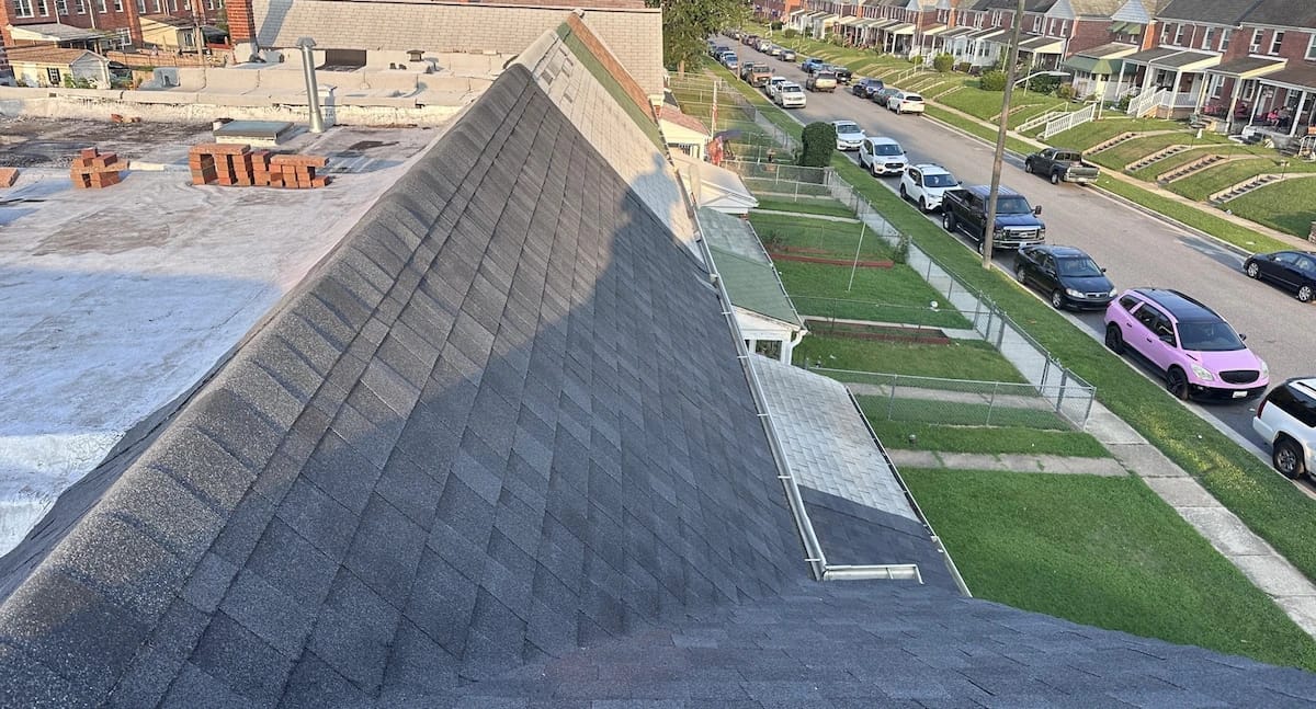 Photo of a mixed shingled and flat roof in DC. 