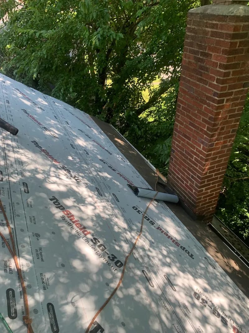 Brown metal standing seam roof installed in Millersville, MD.