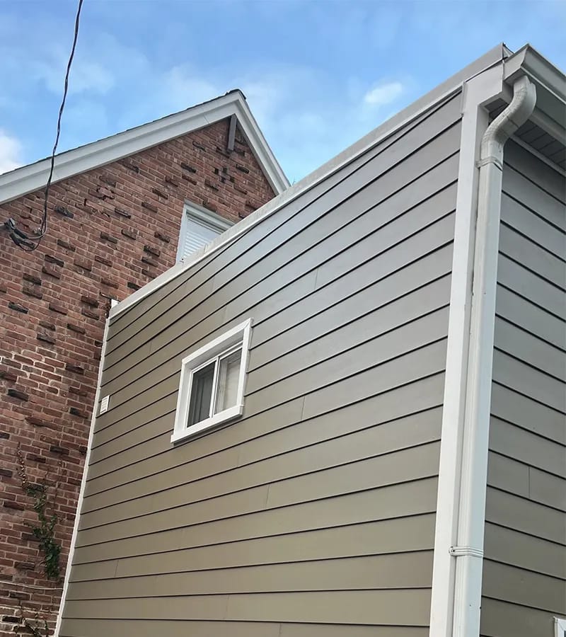 Brown metal standing seam roof installed in Millersville, MD.