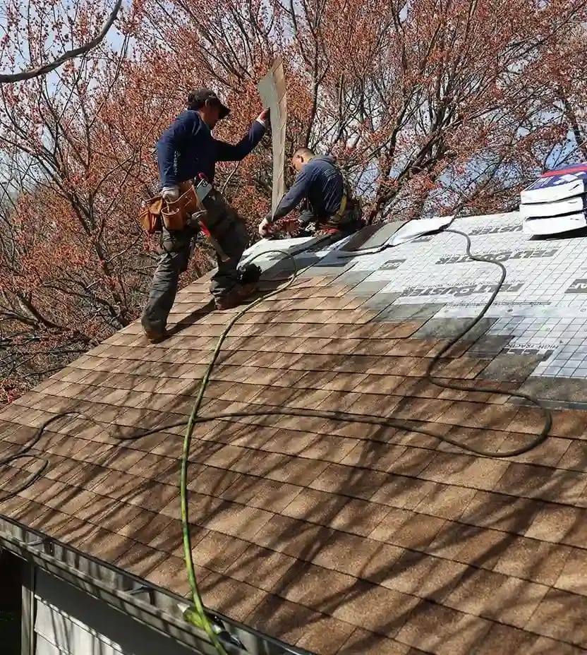 Installation photos of a new GAF Timberline HDZ Shakewood color roof. 