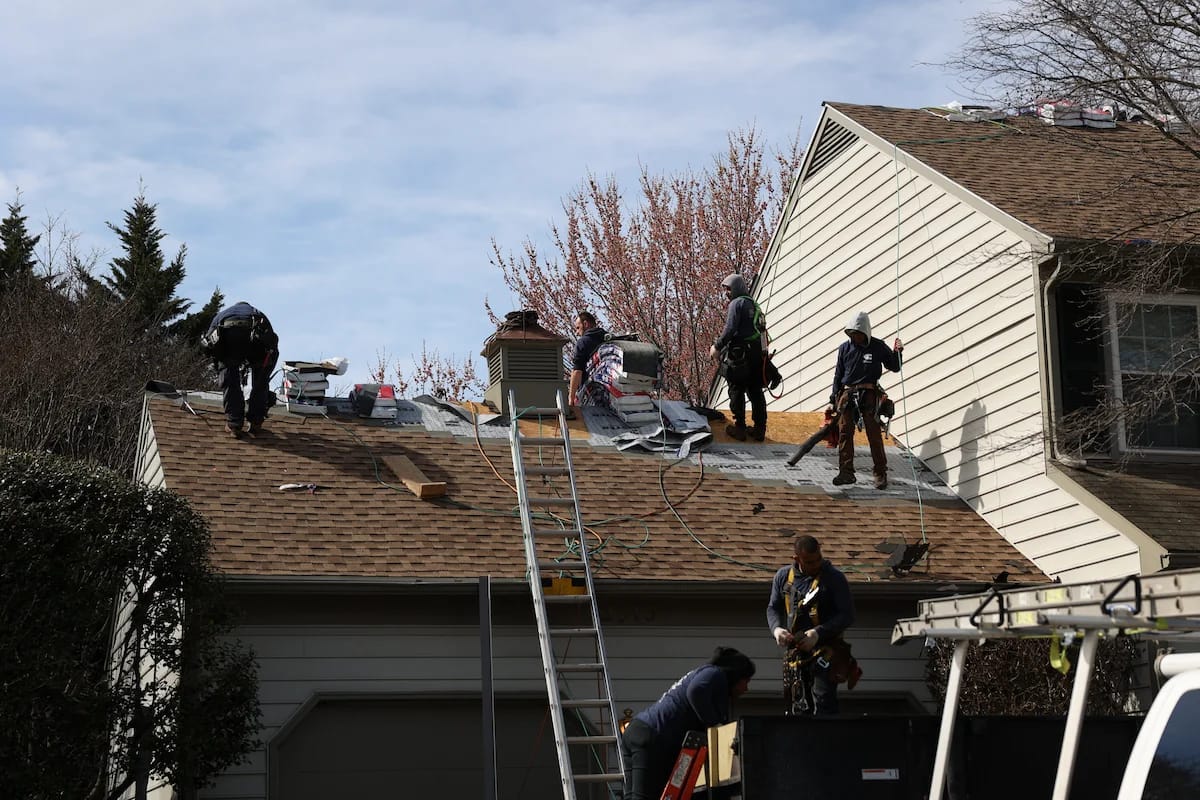 Installation of new GAF Timberline HDZ Weathered Wood shingles in Gaithersburg, MD.